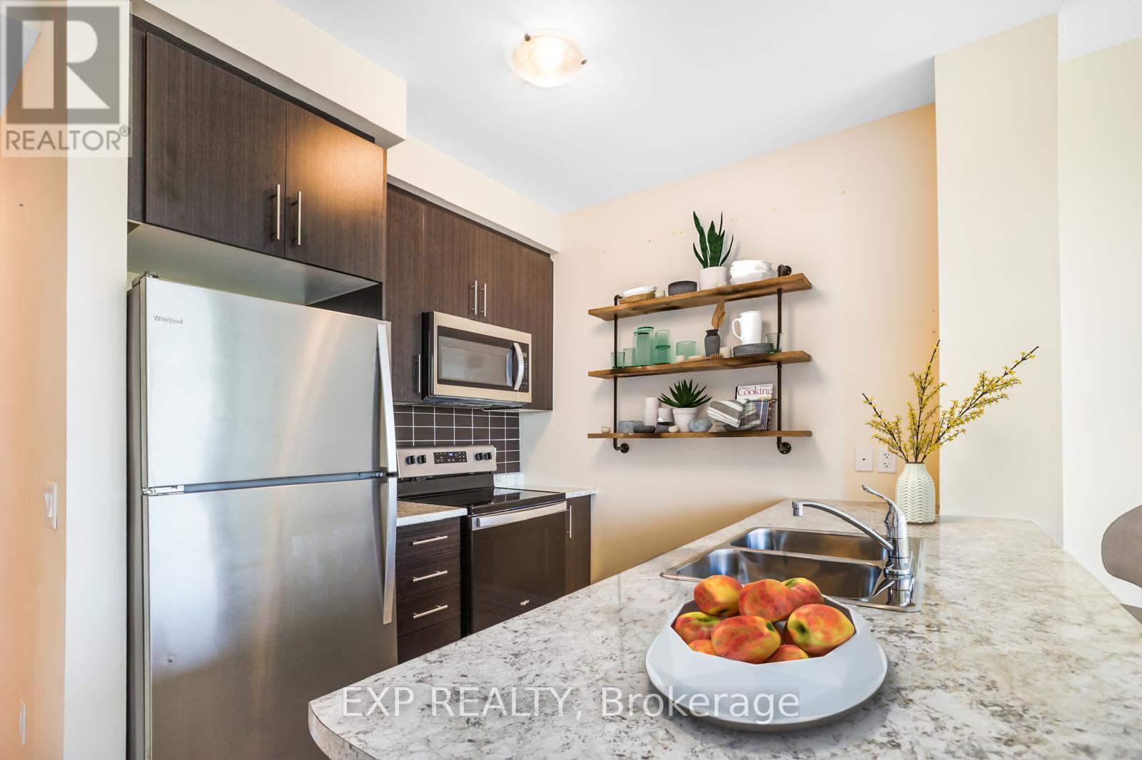 216 - 16 Concord Place, Grimsby, Ontario  L3M 0J1 - Photo 2 - X12444419