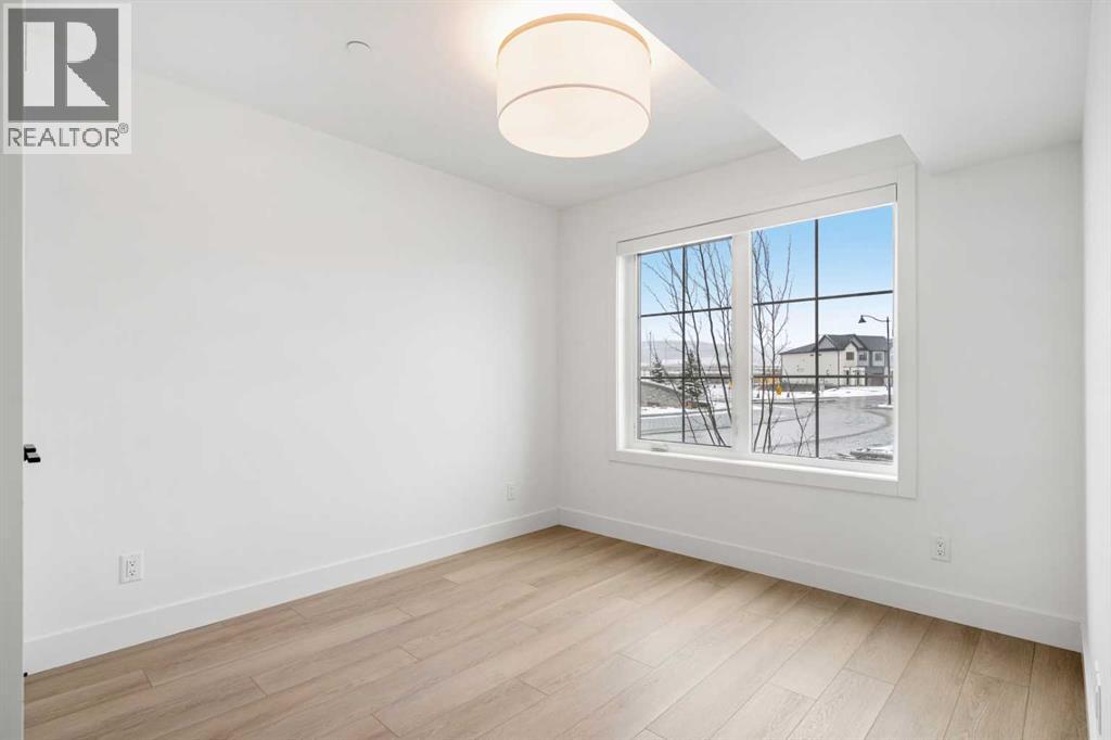 16 Greenwich Heath Nw, Calgary, Alberta  T3B 6P4 - Photo 5 - A2260575
