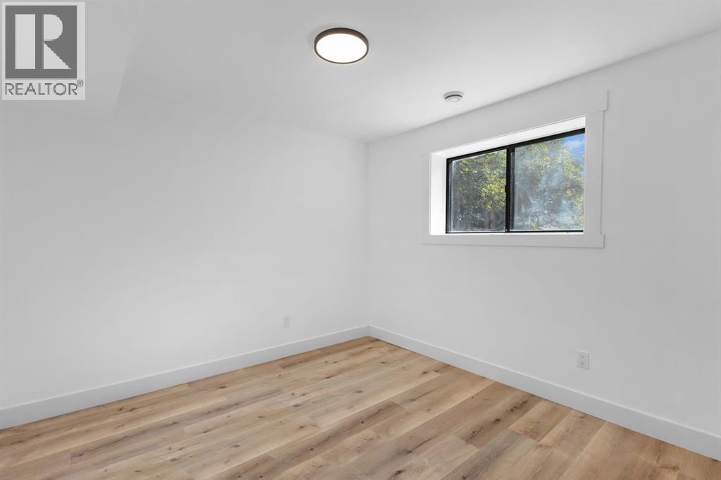 208 Cedarille Green Sw, Calgary, Alberta  T2W 2H4 - Photo 25 - A2260448