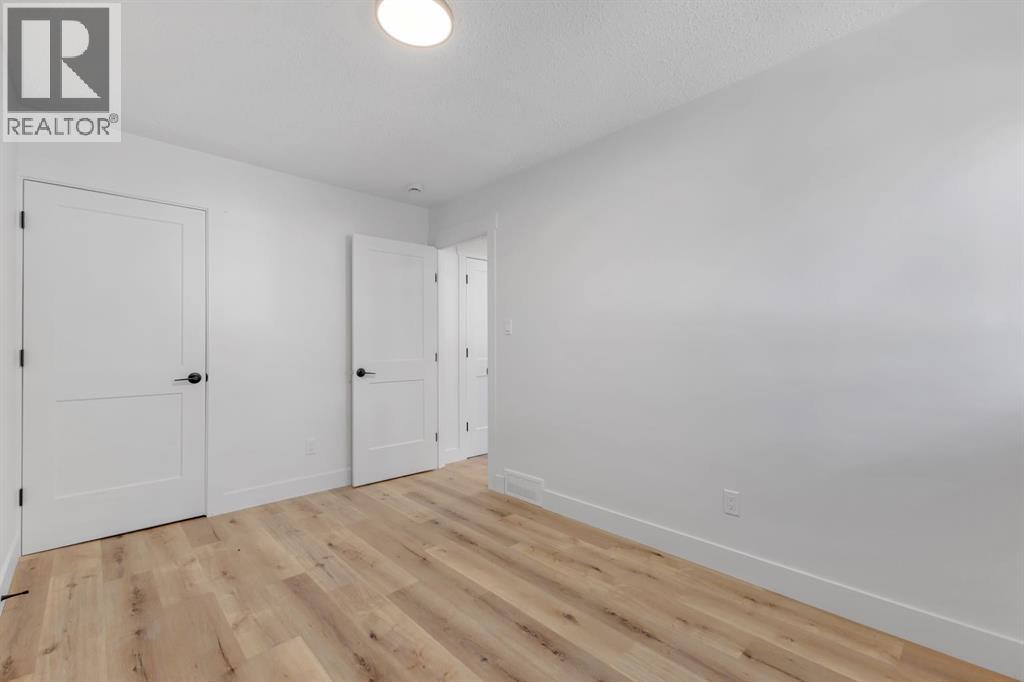 208 Cedarille Green Sw, Calgary, Alberta  T2W 2H4 - Photo 12 - A2260448