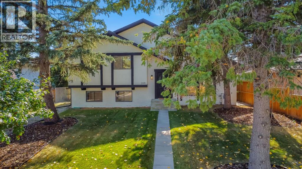 208 Cedarille Green Sw, Calgary, Alberta  T2W 2H4 - Photo 1 - A2260448