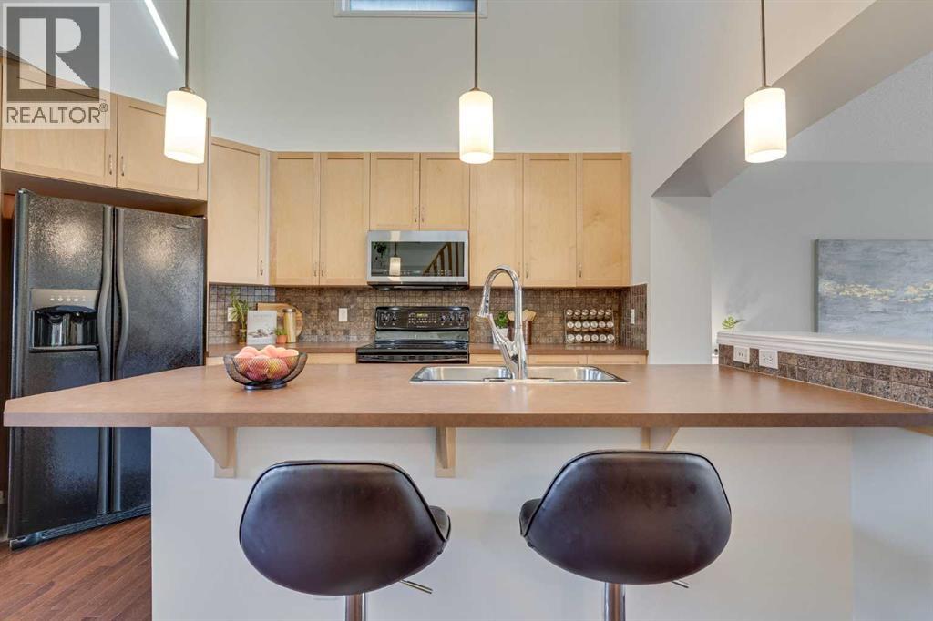 2066 New Brighton Gardens Se, Calgary, Alberta  T2Z 0B6 - Photo 7 - A2257363