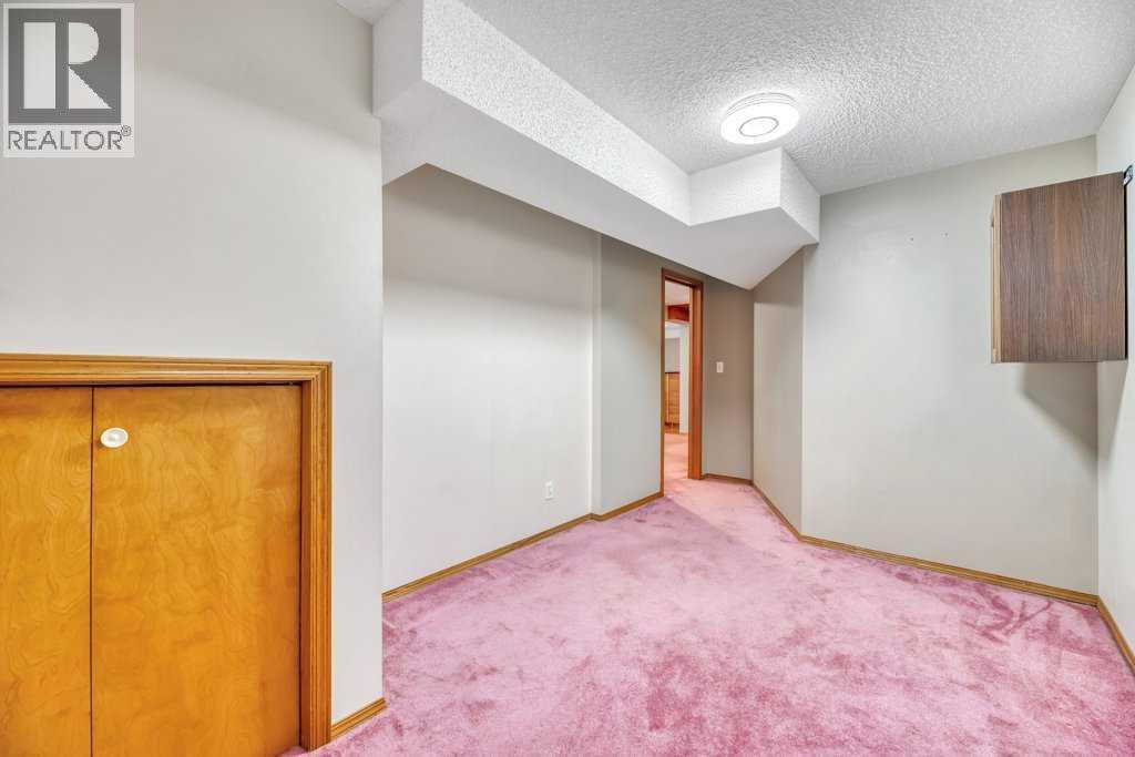 41 Millbank Bay Sw, Calgary, Alberta  T2Y 2Z1 - Photo 32 - A2222216