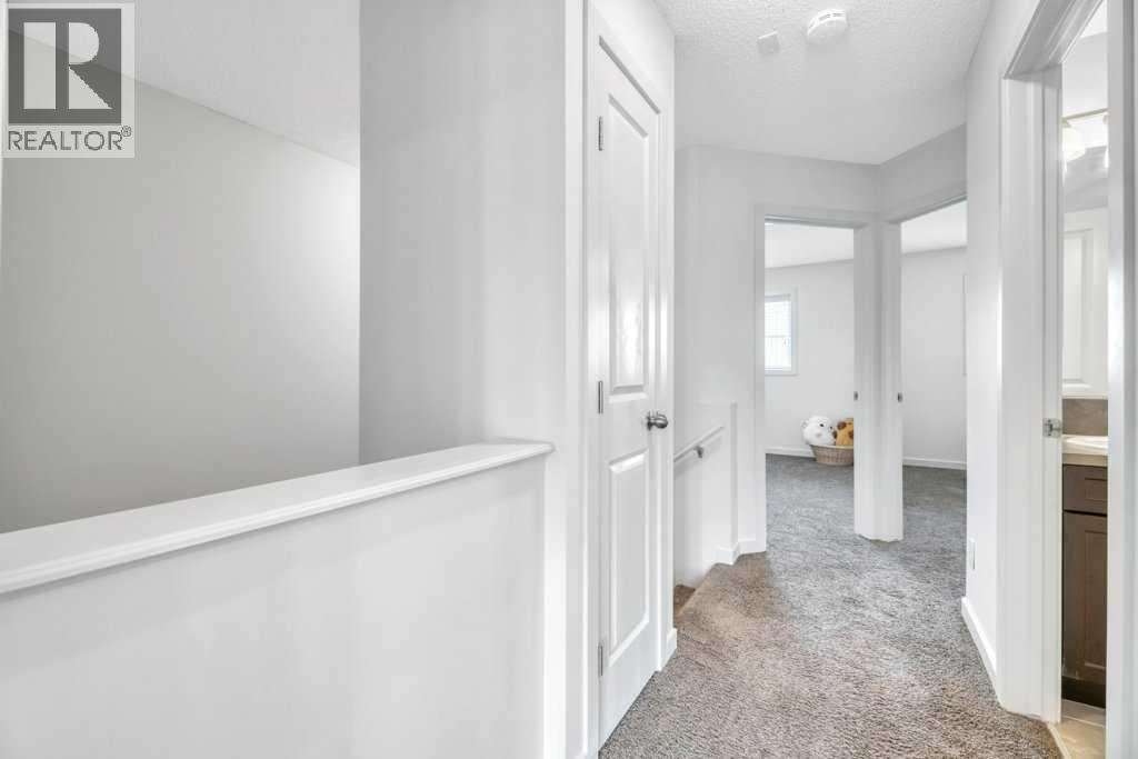 4040 New Brighton Grove Se, Calgary, Alberta  T2Z 1G4 - Photo 12 - A2258026