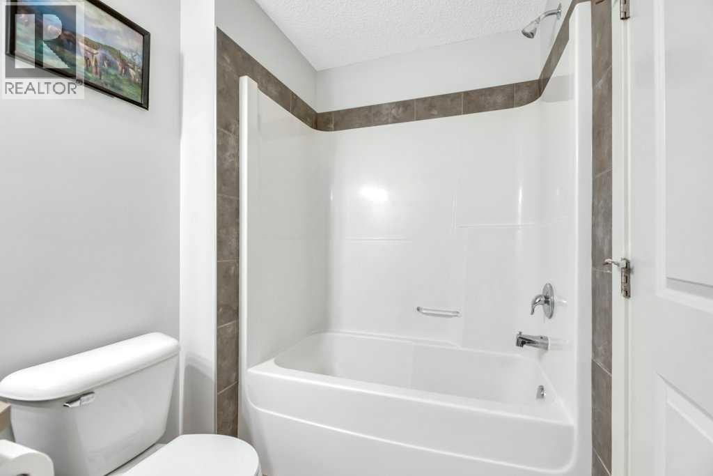 4040 New Brighton Grove Se, Calgary, Alberta  T2Z 1G4 - Photo 16 - A2258026
