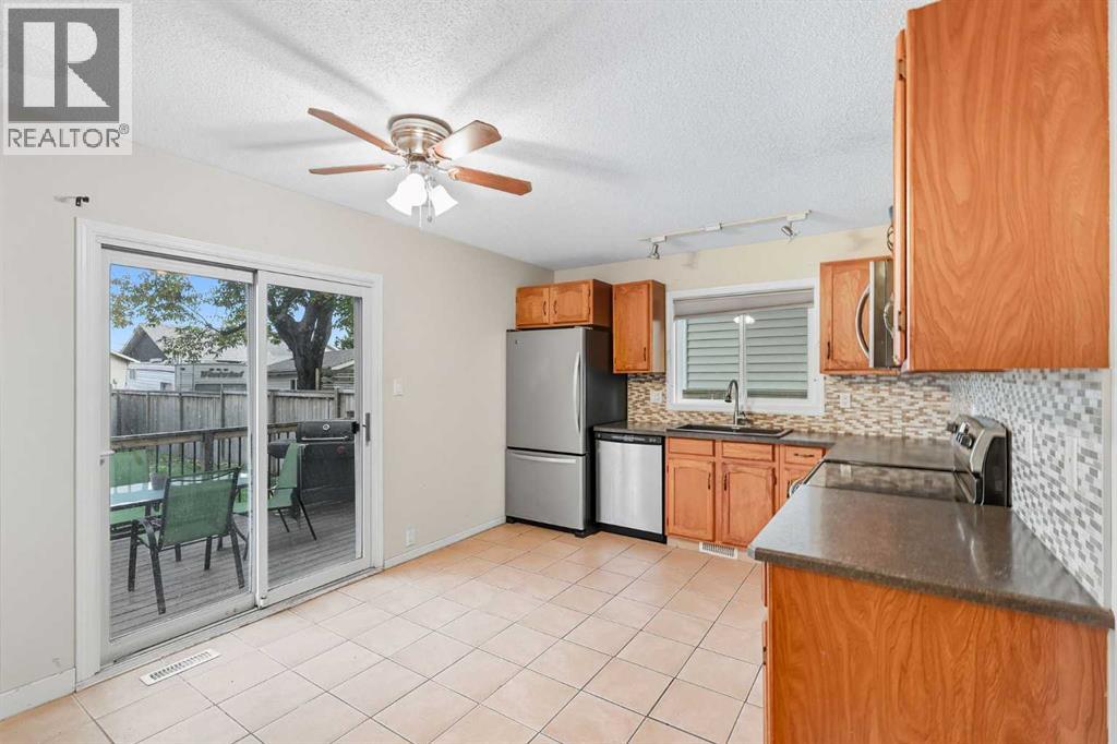 47 Shawglen Place Sw, Calgary, Alberta  T2Y 1X9 - Photo 8 - A2261761