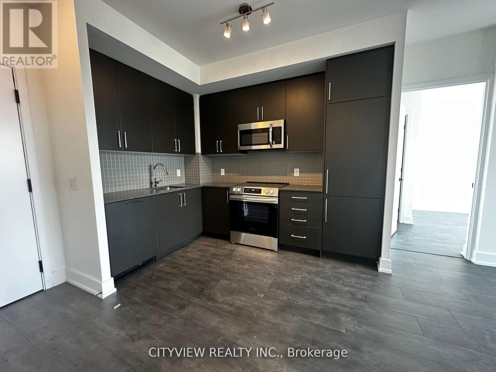 541 - 2450 Old Bronte Road, Oakville, Ontario  L6M 5P6 - Photo 3 - W12444736