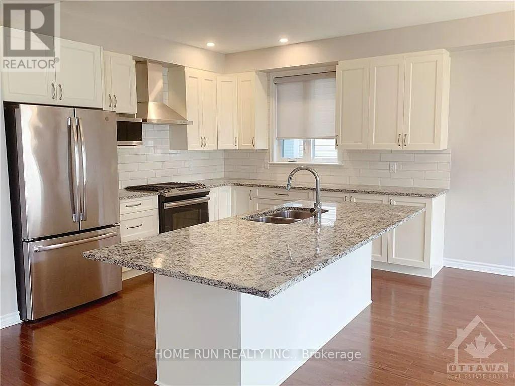 319 Brambling Way, Ottawa, Ontario  K2J 6E4 - Photo 4 - X12444742