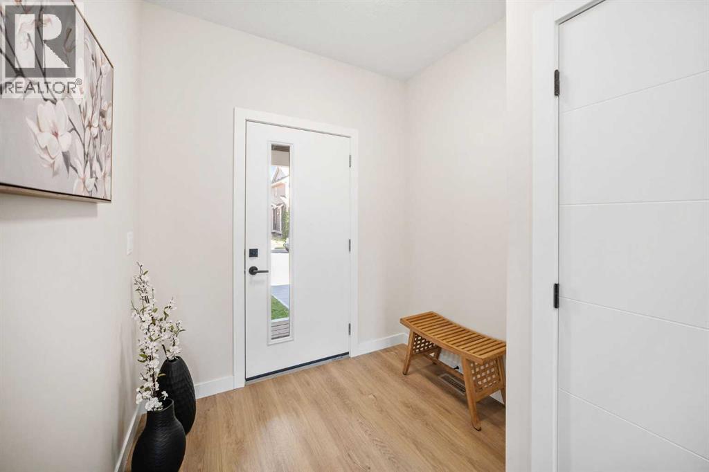 204, 201 Cooperswood Green Sw, Airdrie, Alberta  T3B 3Y6 - Photo 3 - A2259642