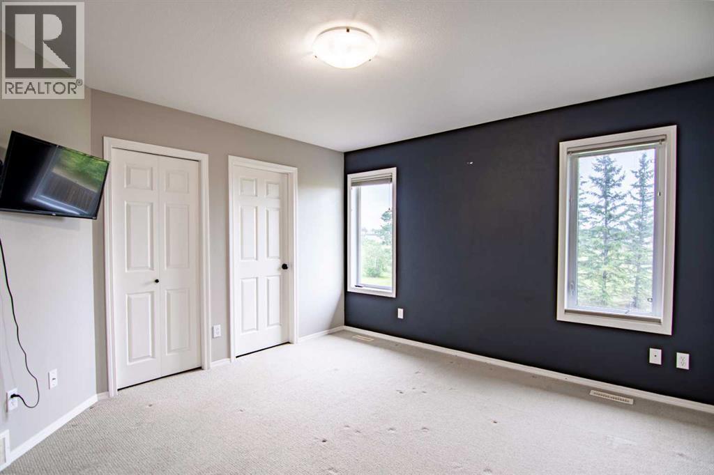 61 Mann Drive, Penhold, Alberta  T0M 1R0 - Photo 31 - A2248337