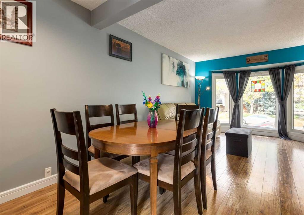 115 Berwick Way Nw, Calgary, Alberta  T3K 1B8 - Photo 7 - A2260898