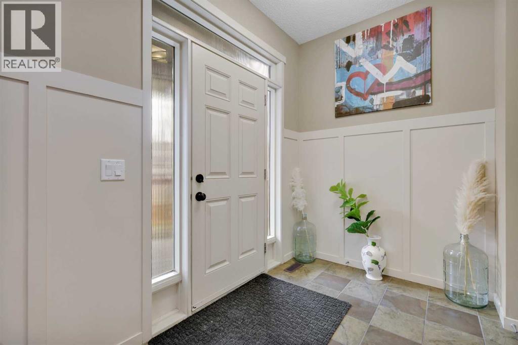 164 Reunion Grove Nw, Airdrie, Alberta  T4B 0Z3 - Photo 4 - A2243503