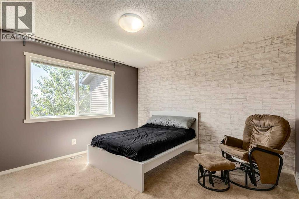 44 Sunvalley Road, Cochrane, Alberta  T4C 0X6 - Photo 27 - A2247610
