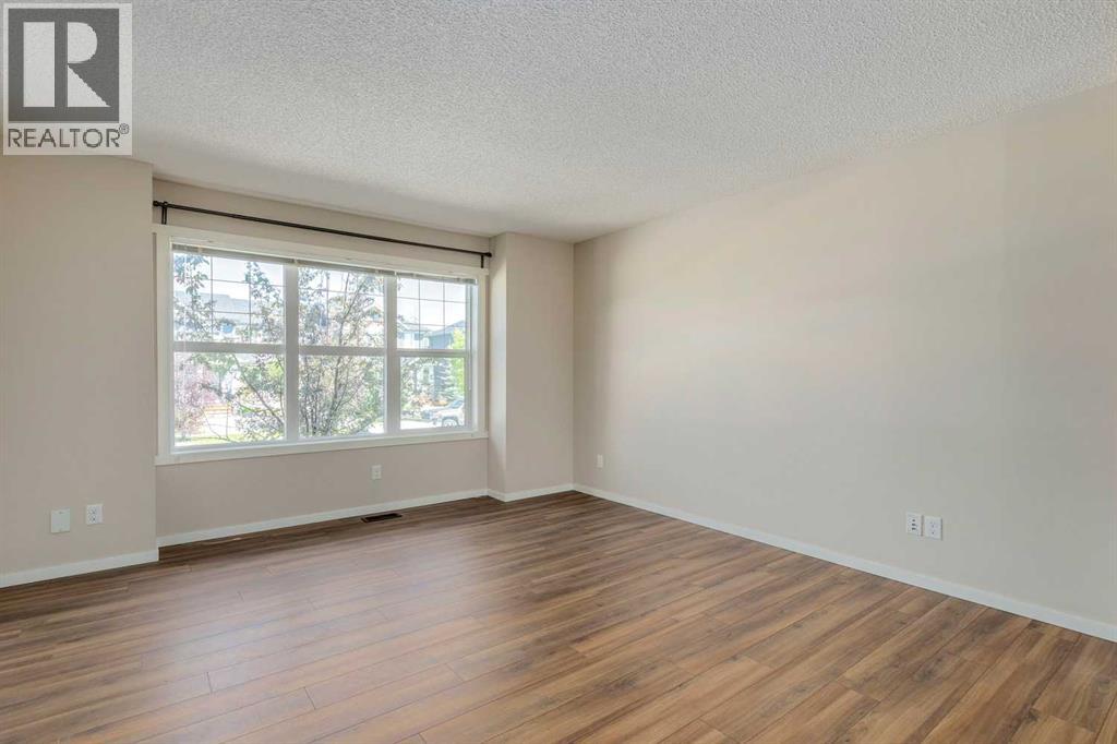 44 Sunvalley Road, Cochrane, Alberta  T4C 0X6 - Photo 6 - A2247610