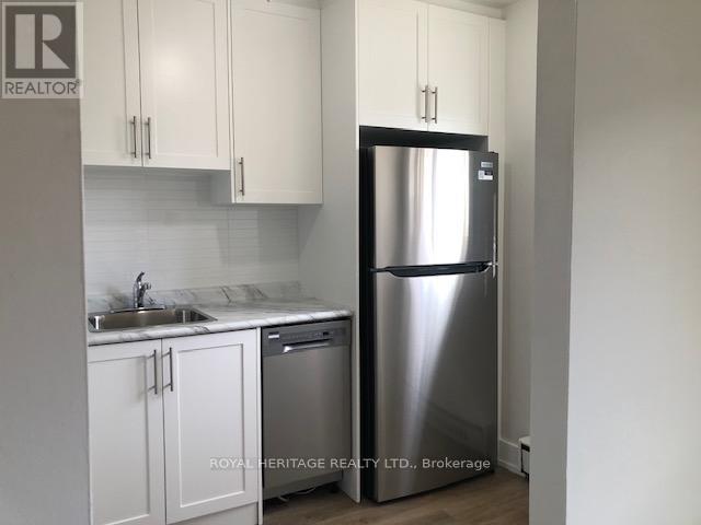 103 - 945 Simcoe Street N, Oshawa, Ontario  L1G 4W3 - Photo 2 - E12444967
