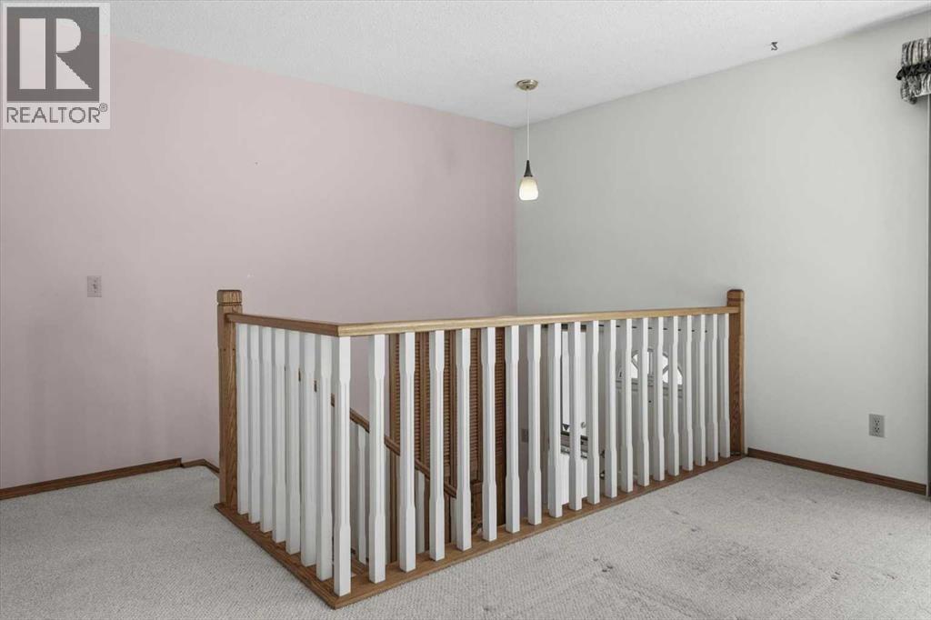 112 Nottingham Road Nw, Calgary, Alberta  T2K 5L8 - Photo 5 - A2261478