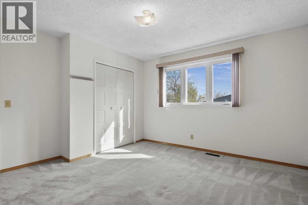 112 Nottingham Road Nw, Calgary, Alberta  T2K 5L8 - Photo 22 - A2261478