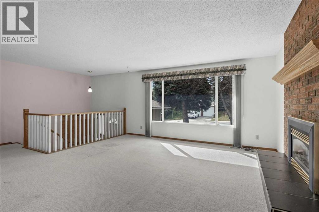 112 Nottingham Road Nw, Calgary, Alberta  T2K 5L8 - Photo 9 - A2261478