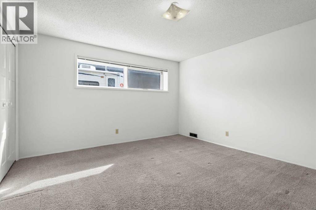 112 Nottingham Road Nw, Calgary, Alberta  T2K 5L8 - Photo 35 - A2261478