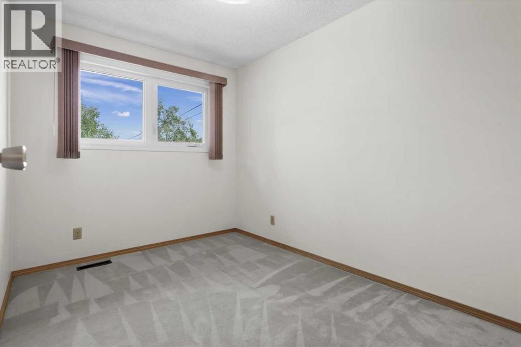 112 Nottingham Road Nw, Calgary, Alberta  T2K 5L8 - Photo 27 - A2261478