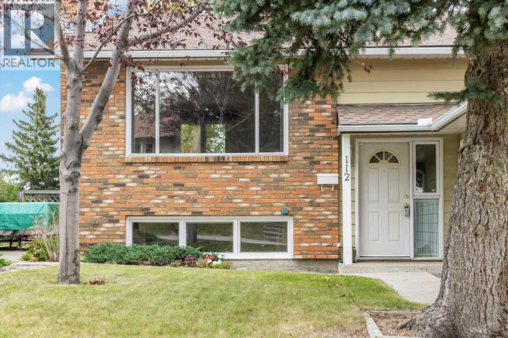 112 Nottingham Road Nw, Calgary, Alberta  T2K 5L8 - Photo 2 - A2261478