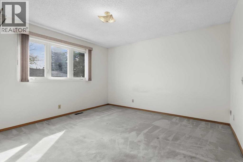 112 Nottingham Road Nw, Calgary, Alberta  T2K 5L8 - Photo 20 - A2261478