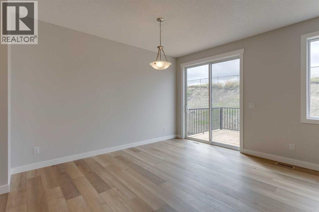 32 Willow Park Point, Cochrane, Alberta  T4C 2V3 - Photo 24 - A2253453