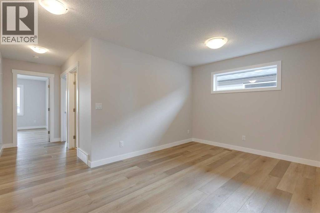 32 Willow Park Point, Cochrane, Alberta  T4C 2V3 - Photo 49 - A2253453