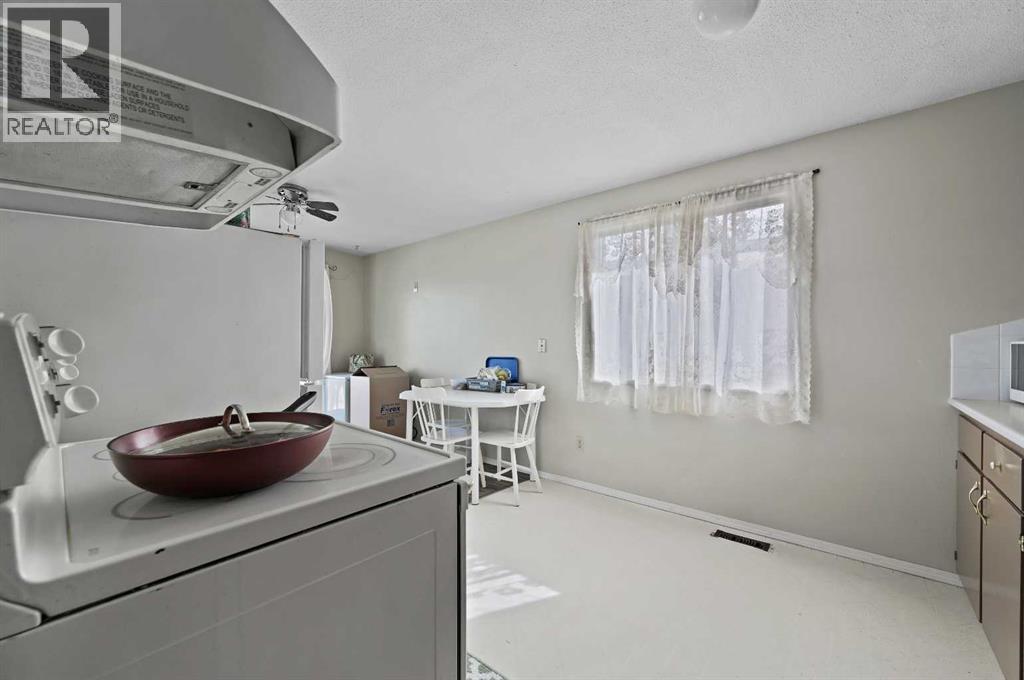 11203 6 Street Sw, Calgary, Alberta  T2W 0E9 - Photo 13 - A2261330