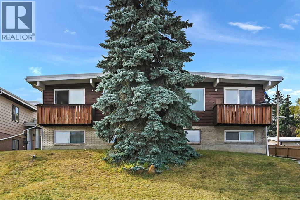 11203 6 Street Sw, Calgary, Alberta  T2W 0E9 - Photo 1 - A2261330