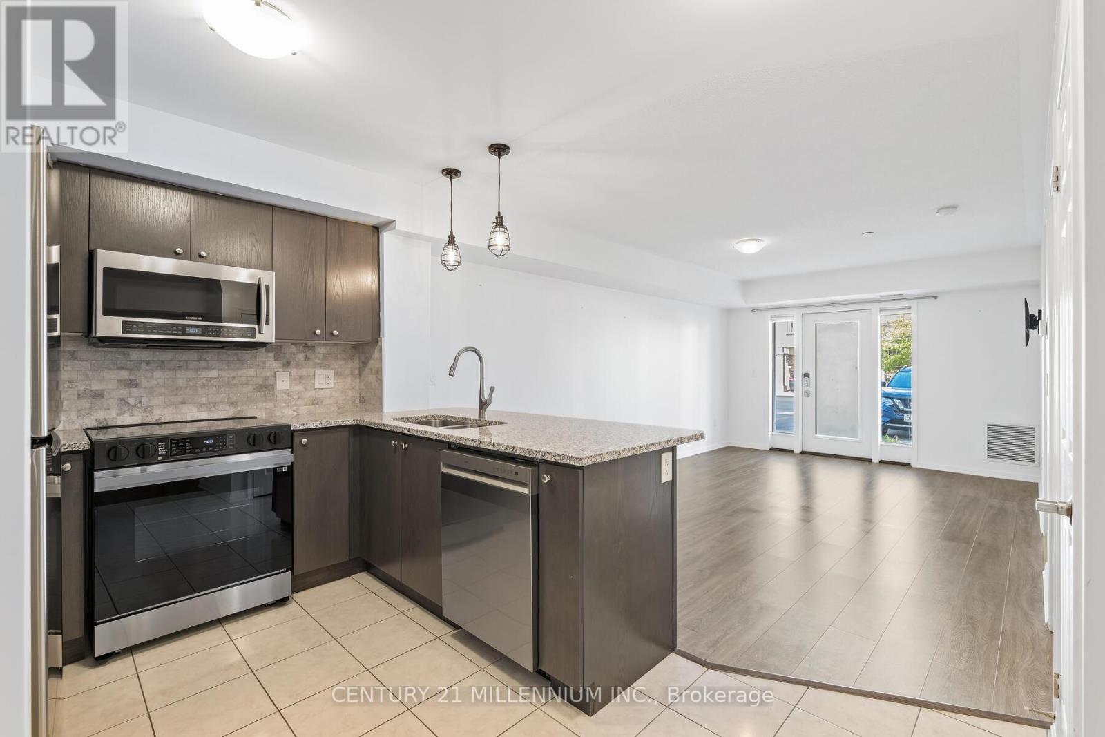 111 - 1045 Nadalin Heights, Milton (Wi Willmott), Ontario  L9T 8R5 - Photo 4 - W12445113