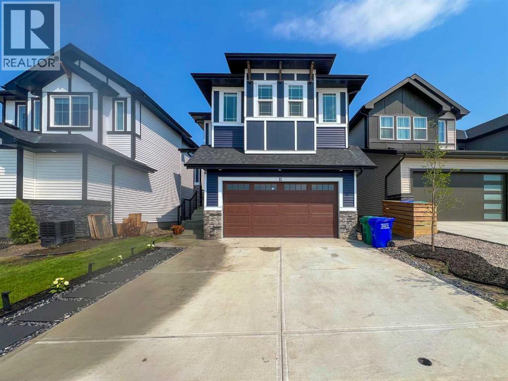 11 Heritage Circle, Cochrane, Alberta  T4C 3G9 - Photo 2 - A2249195