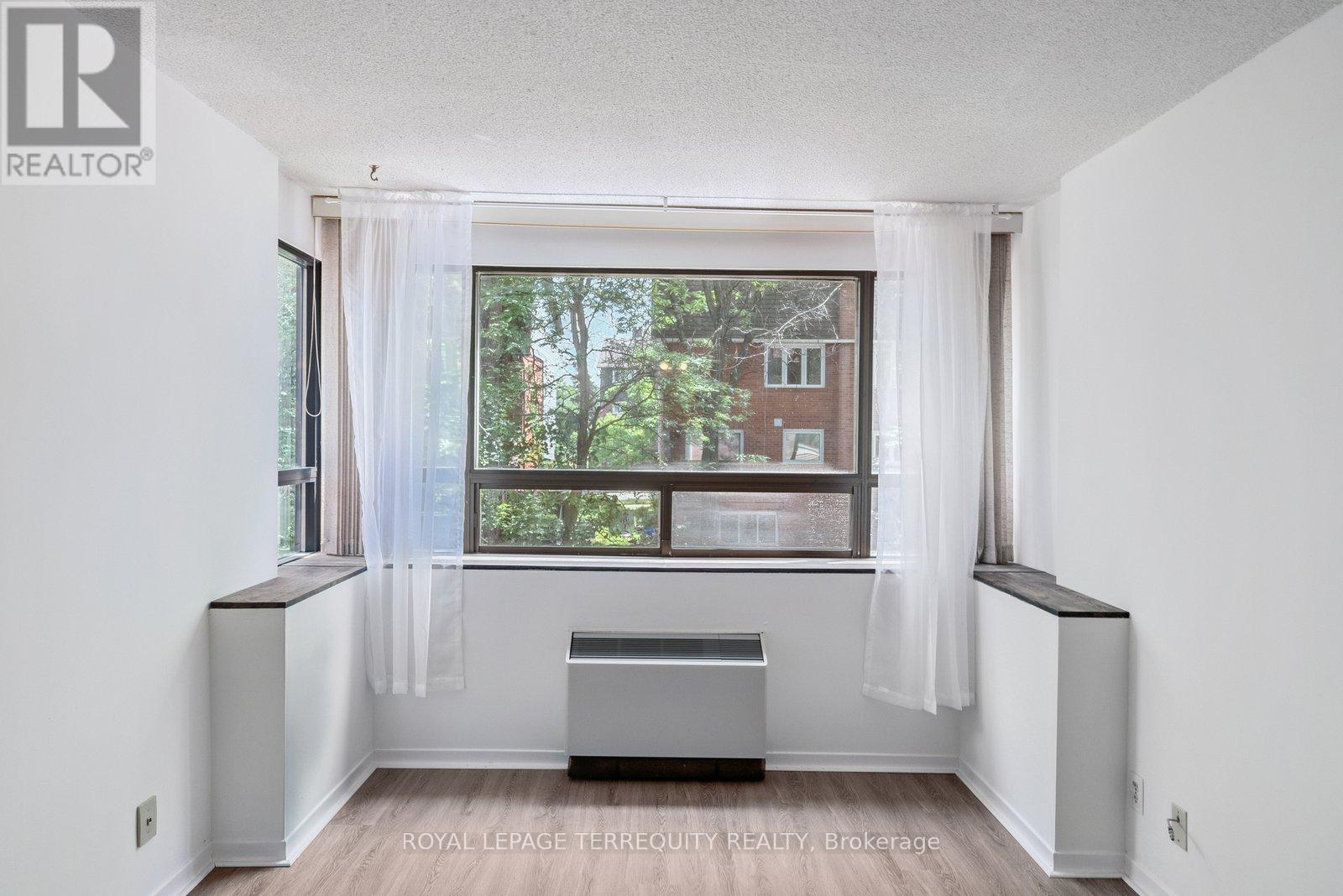 208 - 1275 Cornerbrook Place, Mississauga (Erindale), Ontario  L5C 3J3 - Photo 6 - W12445164