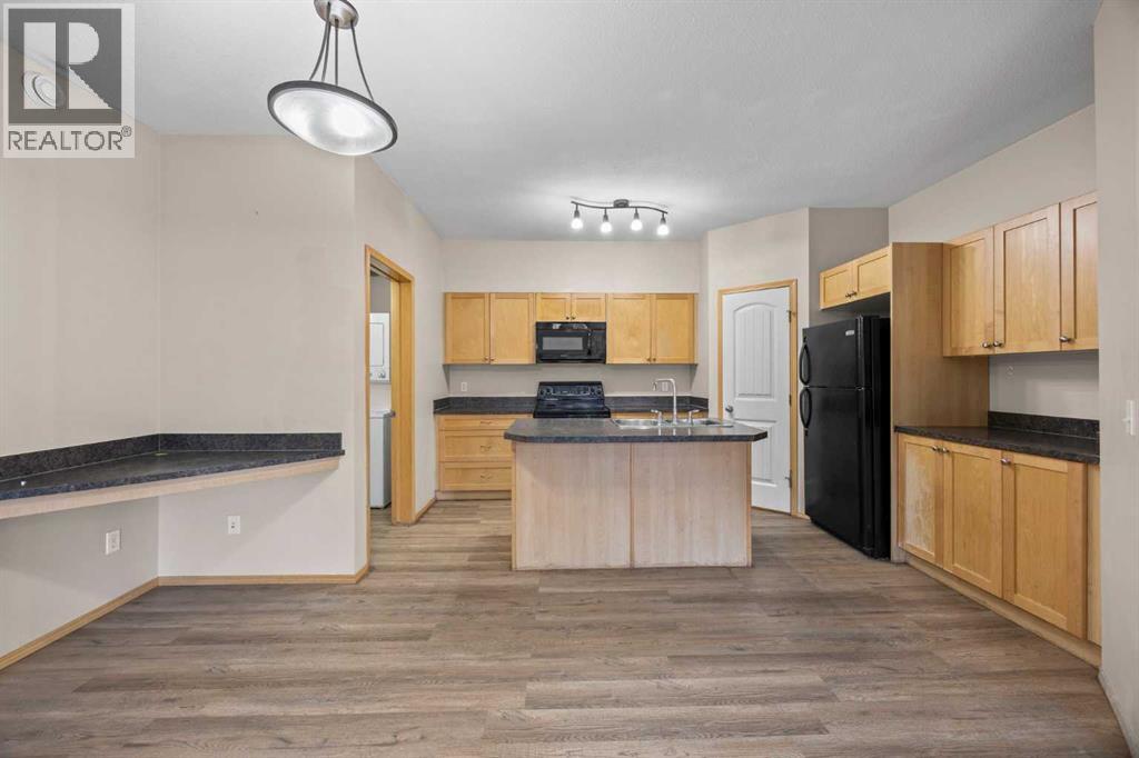 102, 31 Panatella Landing Nw, Calgary, Alberta  T3K 0K8 - Photo 10 - A2250392