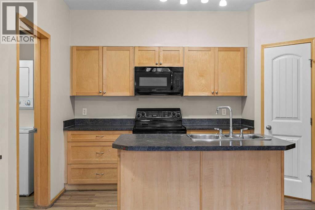 102, 31 Panatella Landing Nw, Calgary, Alberta  T3K 0K8 - Photo 11 - A2250392