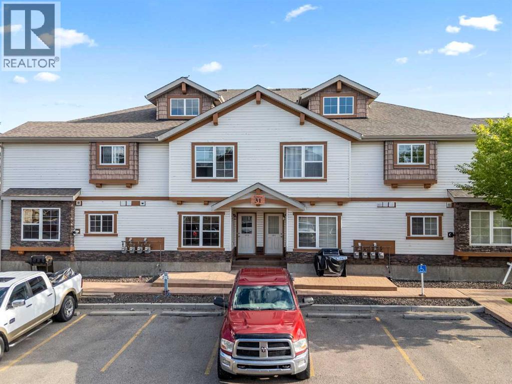 102, 31 Panatella Landing Nw, Calgary, Alberta  T3K 0K8 - Photo 1 - A2250392
