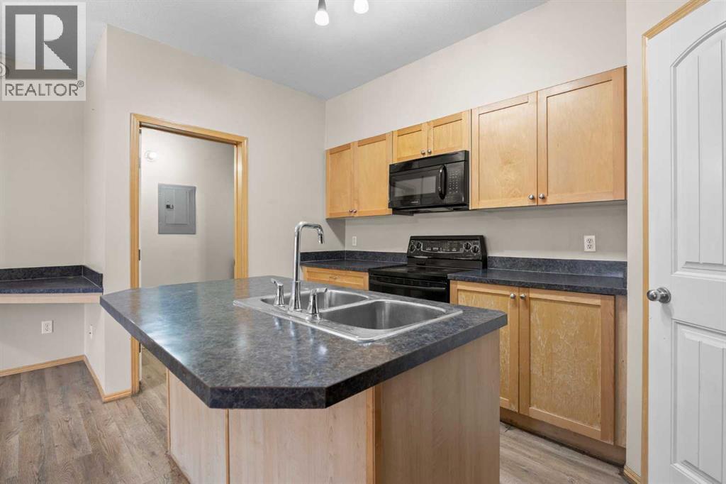 102, 31 Panatella Landing Nw, Calgary, Alberta  T3K 0K8 - Photo 14 - A2250392