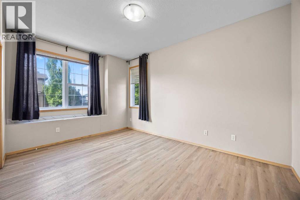 102, 31 Panatella Landing Nw, Calgary, Alberta  T3K 0K8 - Photo 19 - A2250392