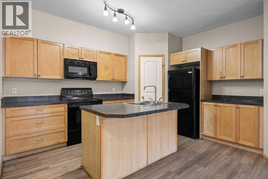 102, 31 Panatella Landing Nw, Calgary, Alberta  T3K 0K8 - Photo 12 - A2250392