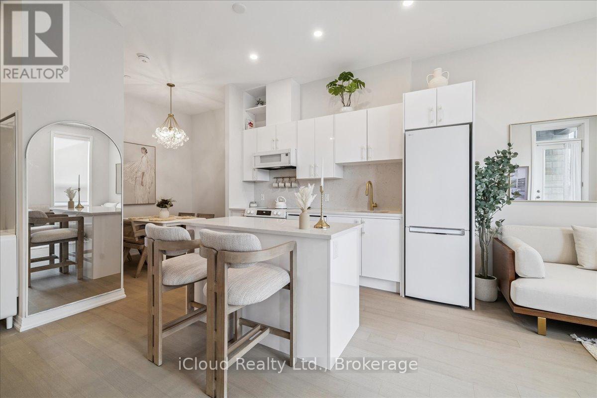101 - 3285 Carding Mill Trail, Oakville, Ontario  L6M 5P8 - Photo 1 - W12392255
