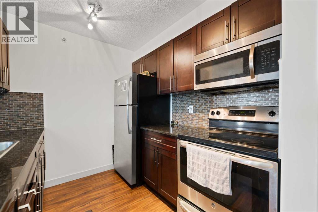411, 15 Saddlestone Way Ne, Calgary, Alberta  T3J 0S3 - Photo 9 - A2253990