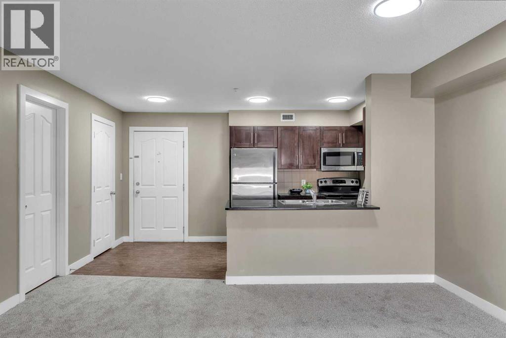 303, 7130 80 Avenue Ne, Calgary, Alberta  T3J 0N6 - Photo 5 - A2262223
