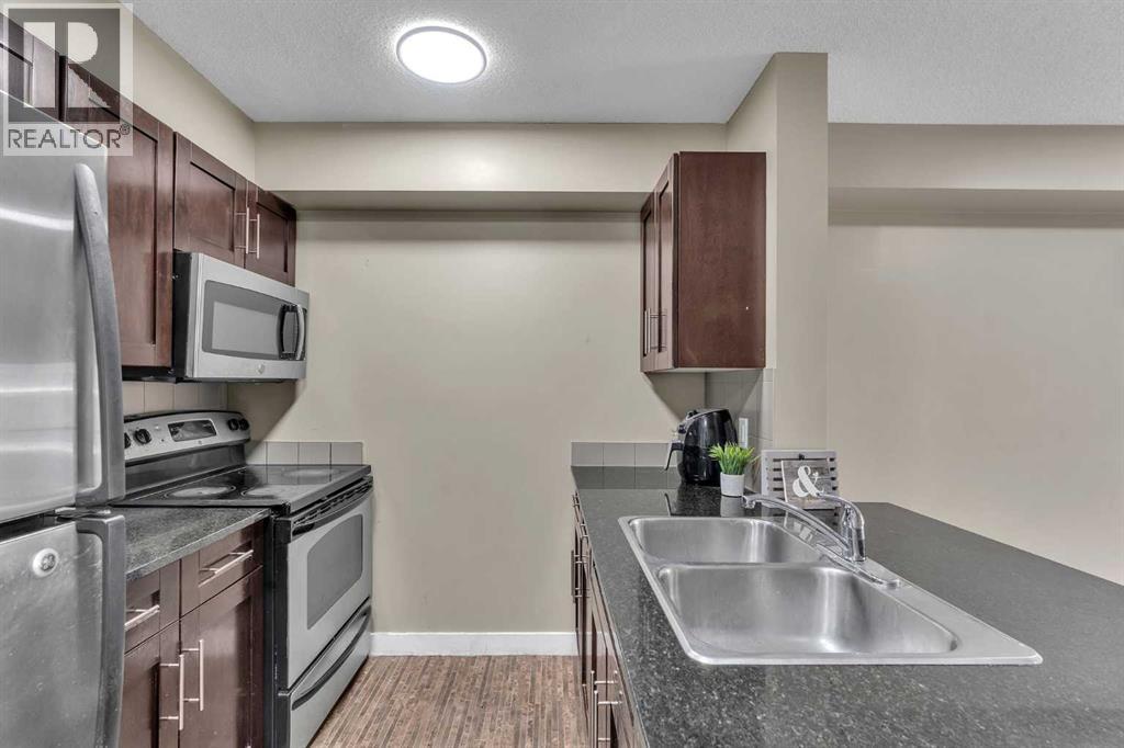 303, 7130 80 Avenue Ne, Calgary, Alberta  T3J 0N6 - Photo 7 - A2262223