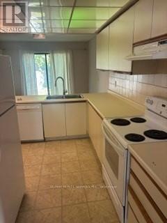 6653 Mockingbird Lane, Mississauga, Ontario  L5N 5K1 - Photo 6 - W12445236