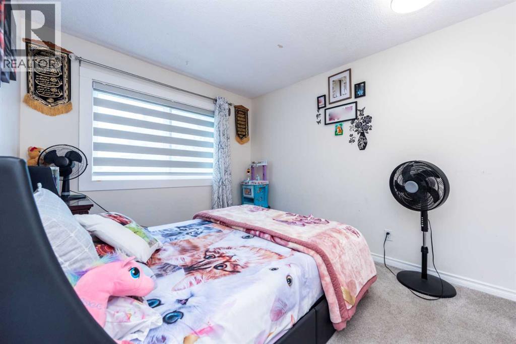 39 Tararidge Drive Ne, Calgary, Alberta  T3J 2R4 - Photo 18 - A2250054