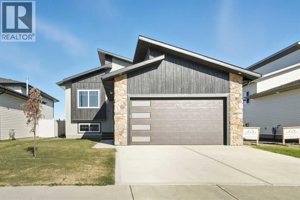 66 Metcalf Way, Lacombe, Alberta  T4L 0J9 - Photo 1 - A2261420