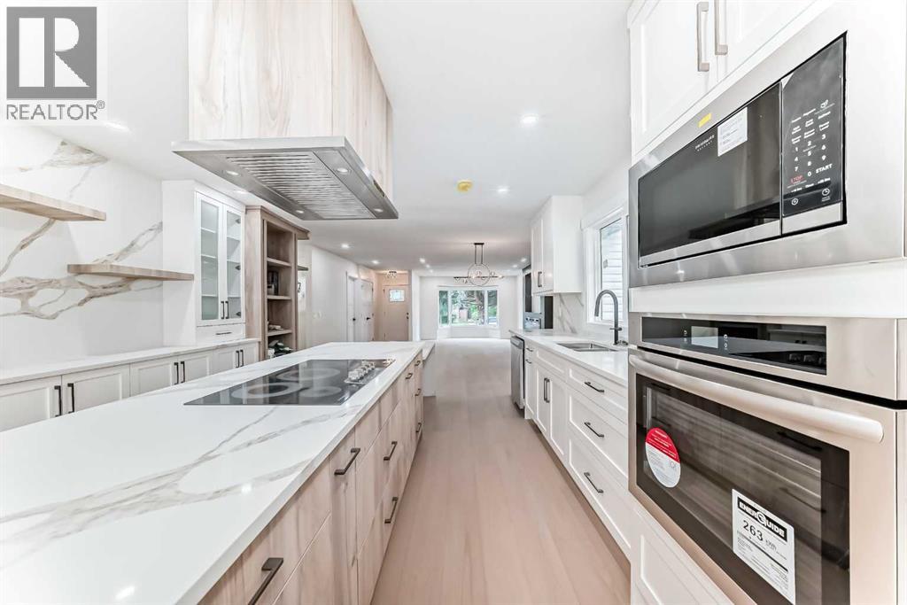 64 Woodstock Road Sw, Calgary, Alberta  T2W 5W2 - Photo 9 - A2243109