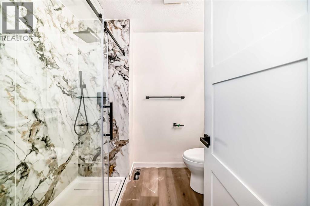 64 Woodstock Road Sw, Calgary, Alberta  T2W 5W2 - Photo 24 - A2243109