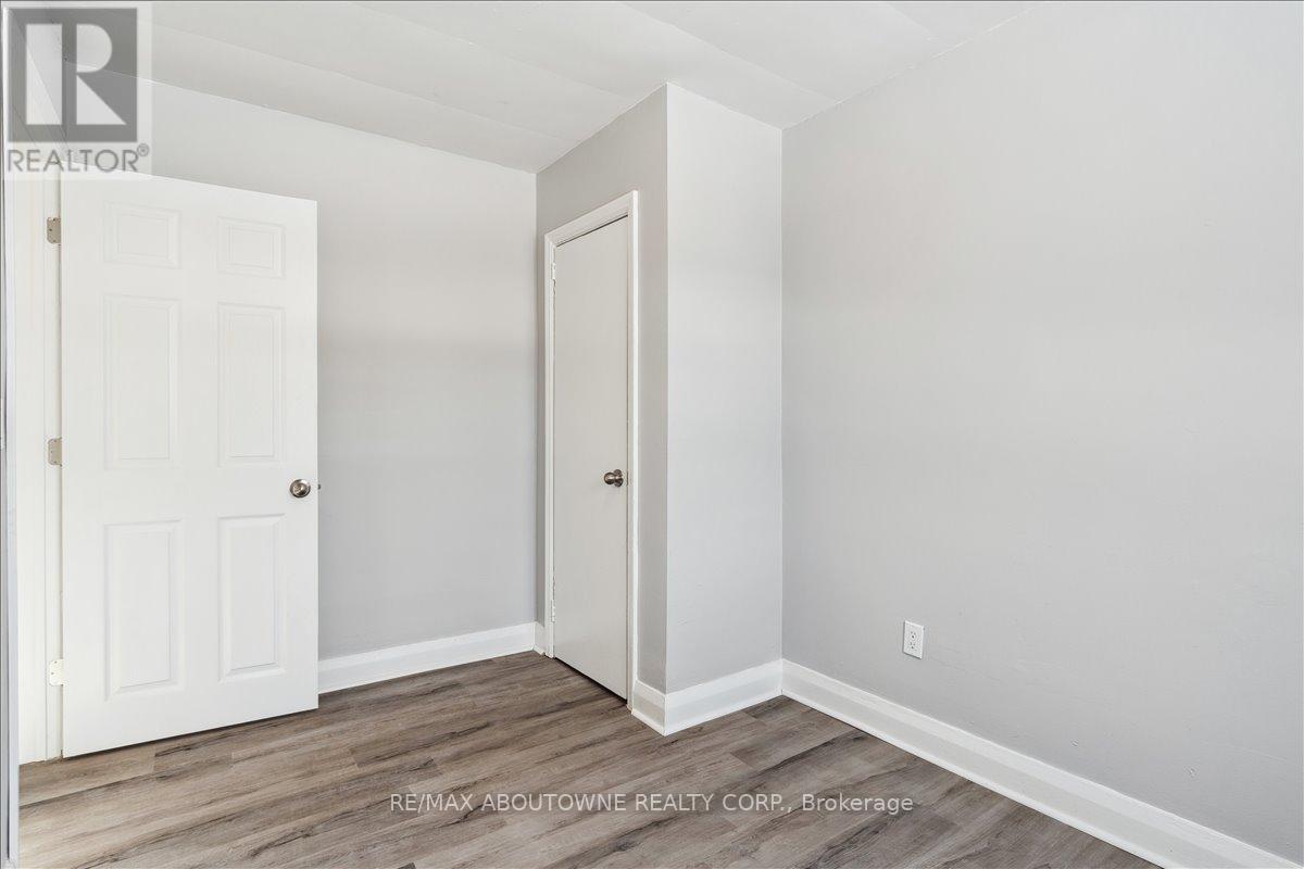 1 - 145 North Service Road E, Oakville, Ontario  L6H 1A3 - Photo 15 - W12445315