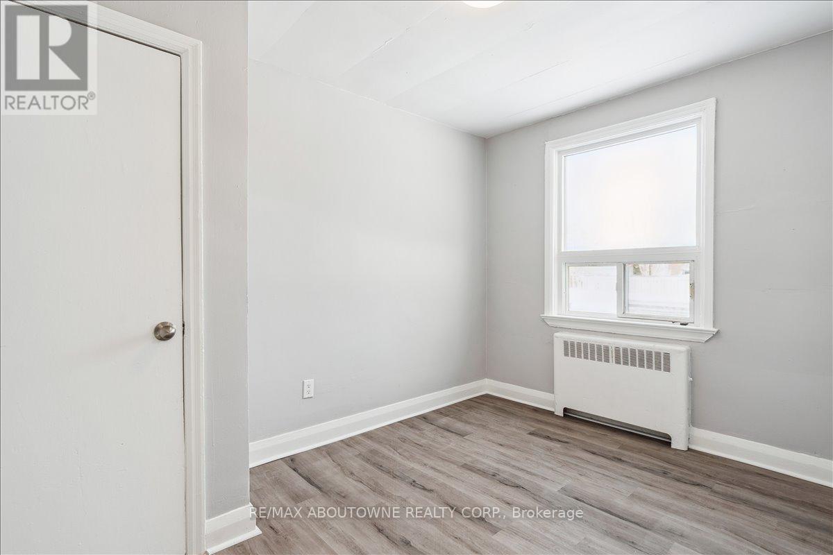 1 - 145 North Service Road E, Oakville, Ontario  L6H 1A3 - Photo 16 - W12445315
